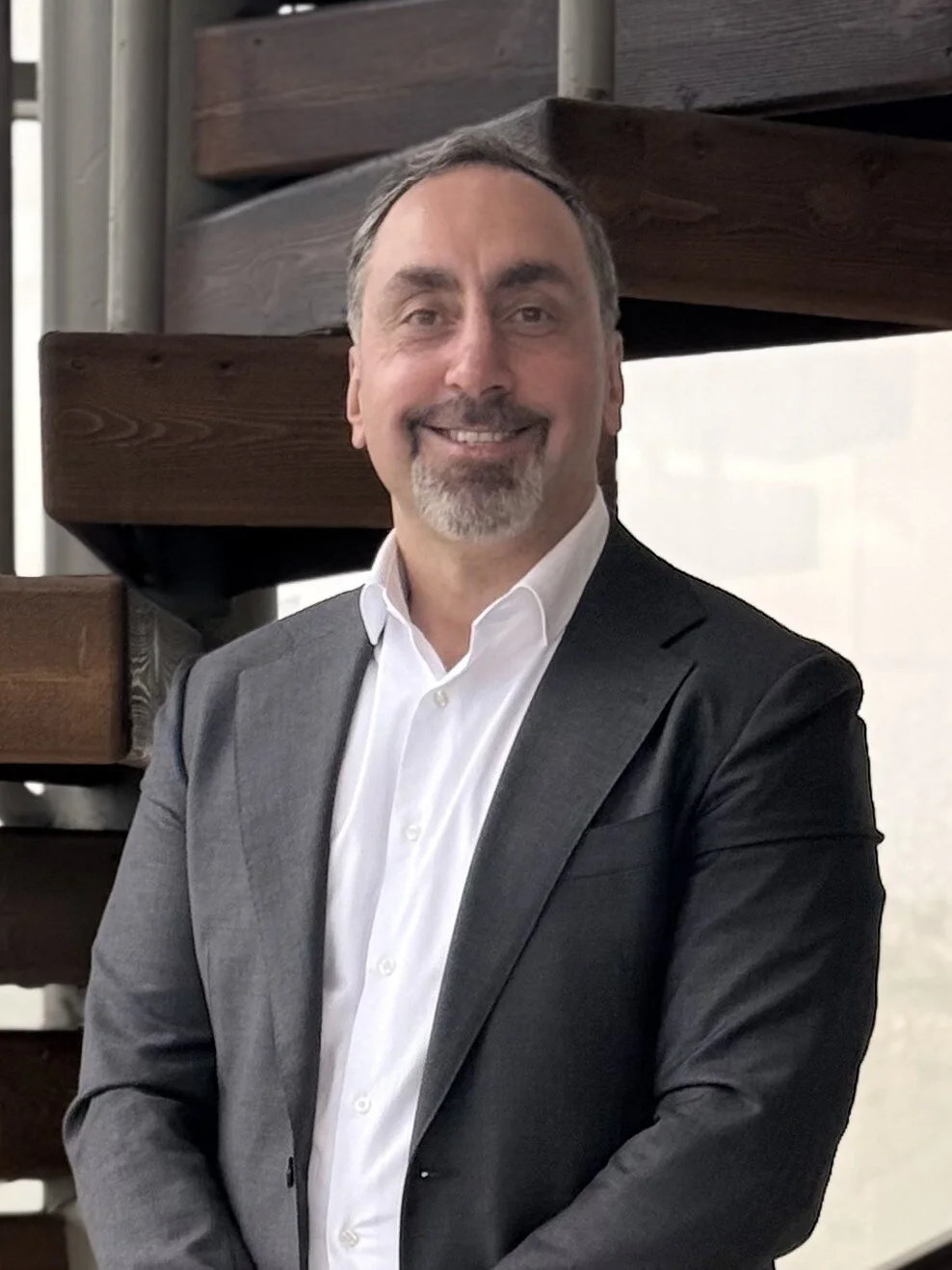 Zahi Abdein smiling in a professional portrait